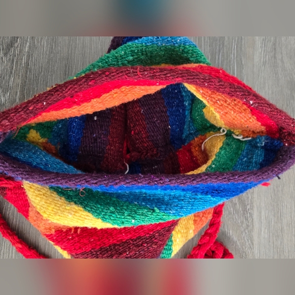 Woven rainbow satchel with a red strap and trim. - Picture 4 of 8